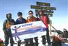 The all-disabled team, on the summit of Kilimanjaro, January 2004.